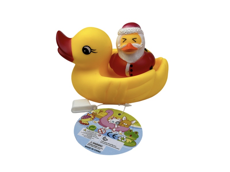 A Little Female Duck Playing In The Bathroom With Santa Claus Duck