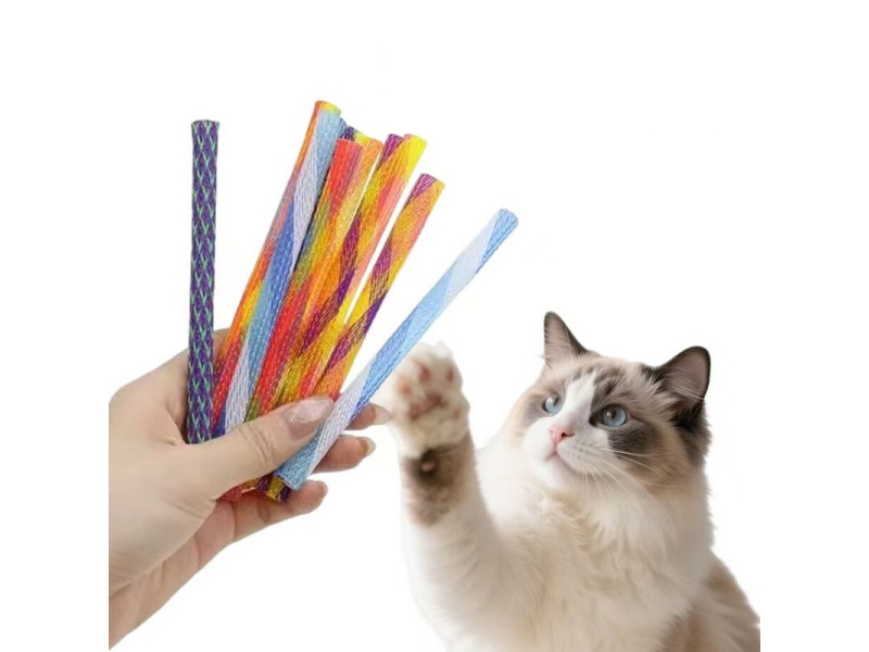 The Cat Is Pulling At The Grid In Multiple Colors