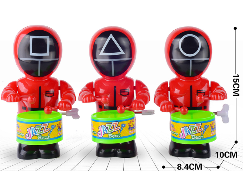 Wind Up Masked Little Red Man Swinging And Beating Drums